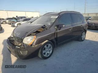 ✅ 2008 Kia Rondo LX • VIN: KNAFG525187201854 • Лот: 74352904. Опубликован ранее на Copart с пробегом 127 716 миль. Бесплатный доступ к архиву аукционных продаж из США и подробный отчёт об истории автомобиля на DreamBid. Изображение 1.
