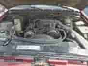 2002 Chevrolet Blazer LS z VIN 1GNDT13W42K185991, wystawiony jako Copart lot #70605164 z przebiegiem 208 342 mil mil oraz Szkoda całkowita • Salvage title. Historia ofert i sprzedaży dostępna na DreamBid. Obrazek 12.