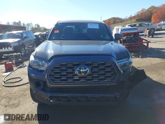 ✅ 2020 Toyota Tacoma SR5 • VIN: 3TMCZ5AN4LM295938 • Lot: 40692316. Listed on IAAI with 75,714 mi. Free auction sales archive from the USA and detailed vehicle history report at DreamBid. Image 12.