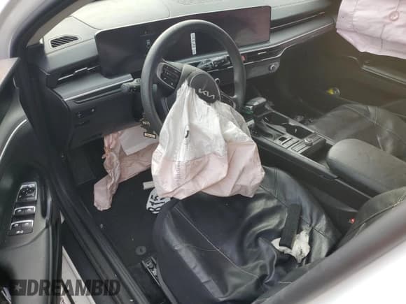 ✅ 2025 Kia K5 LXS • VIN: KNAG24J79S5318701 • Lot: 69001325. Listed on Copart with 22,483 mi. Free auction sales archive from the USA and detailed vehicle history report at DreamBid. Image 8.