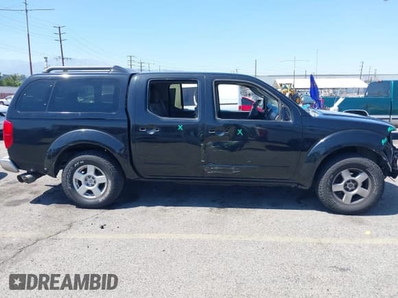 ✅ 2006 Nissan Frontier SE • VIN: 1N6AD07U06C467005 • Лот: 42328522. Опубликован ранее на IAAI с пробегом 131 040 миль. Бесплатный доступ к архиву аукционных продаж из США и подробный отчёт об истории автомобиля на DreamBid. Изображение 14.