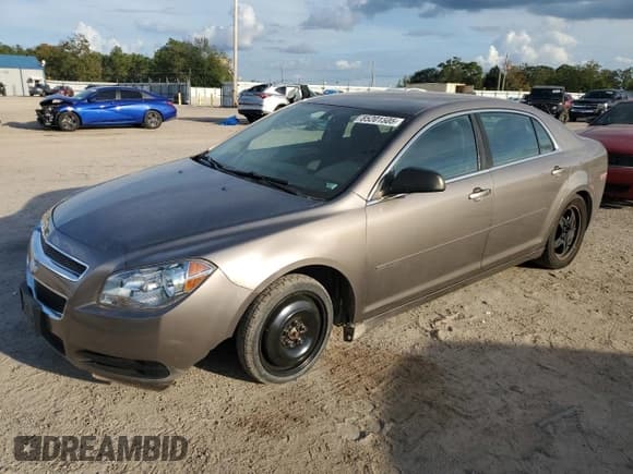 ✅ 2012 Chevrolet Malibu 1LS • VIN: 1G1ZB5E03CF340048 • Lot: 85201505. Listed on Copart with 143,836 mi. Free auction sales archive from the USA and detailed vehicle history report at DreamBid. Image 1.