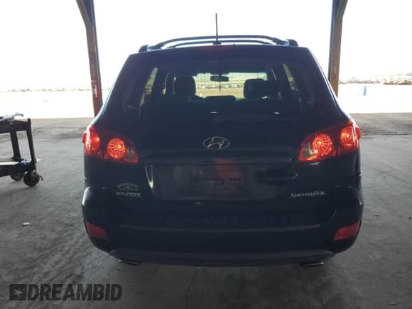 2009 Hyundai Santa Fe Limited z VIN 5NMSH13E99H309610, wystawiony jako Copart lot #90948405 z przebiegiem 205 897 mil mil oraz Czysty tytuł • Clean title. Historia ofert i sprzedaży dostępna na DreamBid. Obrazek 6.