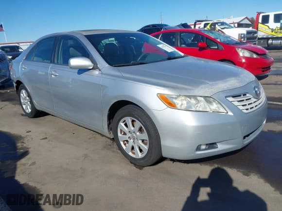 ✅ 2007 Toyota Camry LE • VIN: JTNBK46K273025831 • Лот: 43672211. Опубликован ранее на IAAI с пробегом 340 114 миль. Бесплатный доступ к архиву аукционных продаж из США и подробный отчёт об истории автомобиля на DreamBid. Изображение 1.