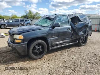 ✅ 2003 GMC Yukon Denali • VIN: 1GKEK63U43J148947 • Lot: 85587805. Listed on Copart with 152,568 mi. Free auction sales archive from the USA and detailed vehicle history report at DreamBid. Image 1.