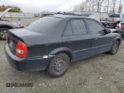 ✅ 2000 Mazda Protege DX • VIN: JM1BJ2221Y0266722 • Lot: 77600224. Wystawiony na Copart z przebiegiem 188 427 mil. Bezpłatny archiwum sprzedaży aukcyjnych z USA i szczegółowy raport historii pojazdu na DreamBid. Zdjęcie 3.