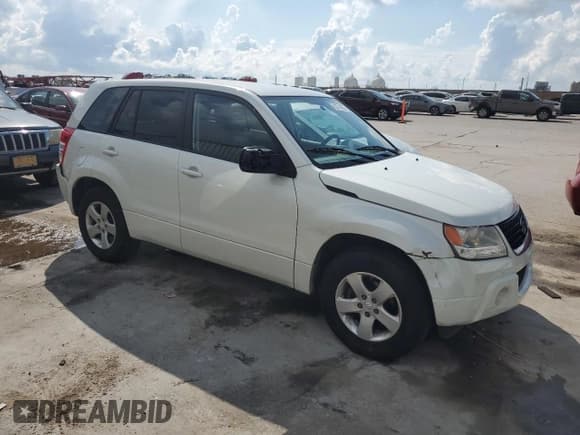 ✅ 2012 Suzuki Grand Vitara Premium • VIN: JS3TE0D64C4100145 • Lot: 62714985. Listed on Copart with 55,786 mi. Free auction sales archive from the USA and detailed vehicle history report at DreamBid. Image 4.