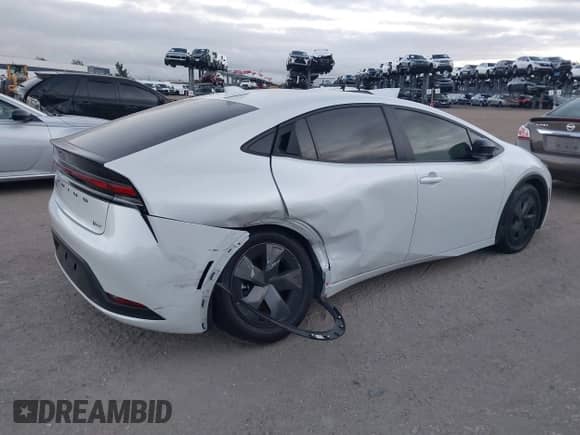 2024 Toyota Prius LE with VIN JTDACAAU6R3035544, listed as a IAAI auction lot 43413536 with 19,097 mi miles and . Bid and sale history available at DreamBid. Image 4.