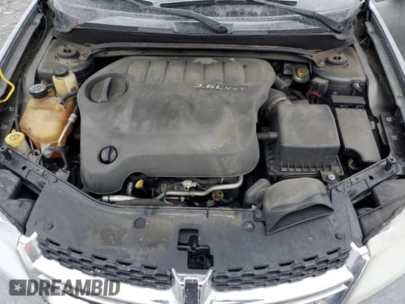 ✅ 2012 Dodge Avenger SXT Plus • VIN: 1C3CDZEG7CN185719 • Лот: 41427755. Опубликован ранее на Copart с пробегом 120 101 миль. Бесплатный доступ к архиву аукционных продаж из США и подробный отчёт об истории автомобиля на DreamBid. Изображение 11.