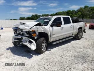 ✅ 2017 Chevrolet Silverado 2500HD High Country • VIN: 1GC1KXEY6HF215865 • Лот: 49956654. Опубликован ранее на Copart с пробегом 124 239 миль. Бесплатный доступ к архиву аукционных продаж из США и подробный отчёт об истории автомобиля на DreamBid. Изображение 1.