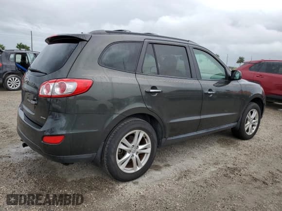 ✅ 2012 Hyundai Santa Fe Limited • VIN: 5XYZK4AG1CG115502 • Lot: 75128574. Listed on Copart with 101,155 mi. Free auction sales archive from the USA and detailed vehicle history report at DreamBid. Image 3.