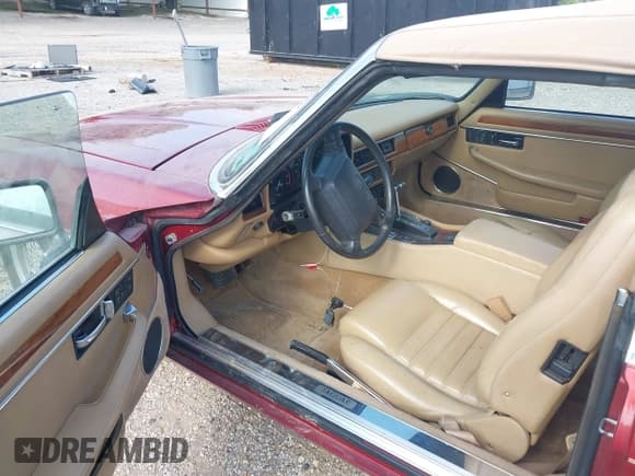 ✅ 1993 Jaguar XJS • VIN: SAJNW4744PC186804 • Лот: 42490722. Опубликован ранее на IAAI с пробегом 128 488 миль. Бесплатный доступ к архиву аукционных продаж из США и подробный отчёт об истории автомобиля на DreamBid. Изображение 14.
