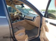 ✅ 2011 Porsche Cayenne S Hybrid • VIN: WP1AE2A29BLA94414 • Lot: 41644386. Wystawiony na IAAI z przebiegiem 76 095 mil. Bezpłatny archiwum sprzedaży aukcyjnych z USA i szczegółowy raport historii pojazdu na DreamBid. Zdjęcie 5.