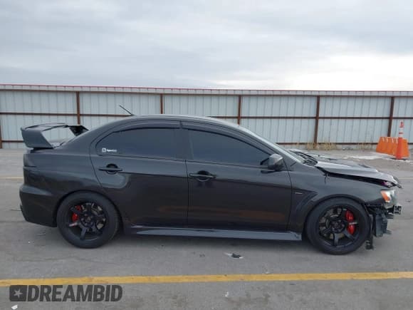 ✅ 2013 Mitsubishi Lancer Evolution GSR • VIN: JA32W8FV8DU012080 • Lot: 41379744. Wystawiony na IAAI z przebiegiem 95 070 mil. Bezpłatny archiwum sprzedaży aukcyjnych z USA i szczegółowy raport historii pojazdu na DreamBid. Zdjęcie 14.