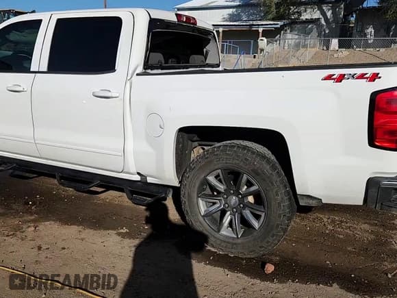 ✅ 2018 Chevrolet Silverado 1500 LT • VIN: 3GCUKREC7JG575423 • Lot: 84760995. Listed on Copart with 182,921 mi. Free auction sales archive from the USA and detailed vehicle history report at DreamBid. Image 13.