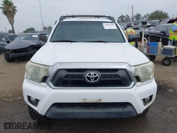 ✅ 2012 Toyota Tacoma PreRunner • VIN: 3TMKU4HN7CM032000 • Lot: 43086689. Listed on IAAI with 130,040 mi. Free auction sales archive from the USA and detailed vehicle history report at DreamBid. Image 12.