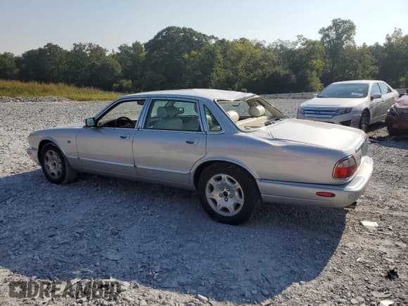 ✅ 2003 Jaguar XJ 8 • VIN: SAJDA14C33LF59266 • Lot: 71877055. Wystawiony na Copart z przebiegiem 145 384 mil. Bezpłatny archiwum sprzedaży aukcyjnych z USA i szczegółowy raport historii pojazdu na DreamBid. Zdjęcie 2.