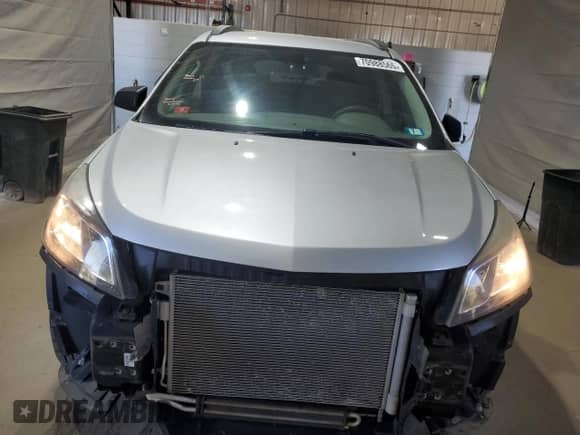 2015 Chevrolet Traverse LS with VIN 1GNKRFED9FJ349584, listed as a Copart auction lot 70988565 with 135,238 mi miles and Salvage title. Bid and sale history available at DreamBid. Image 5.