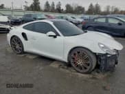 ✅ 2015 Porsche 911 Turbo S • VIN: WP0AD2A92FS166227 • Lot: 95857975. Listed on Copart with 116,024 mi. Free auction sales archive from the USA and detailed vehicle history report at DreamBid. Image 4.