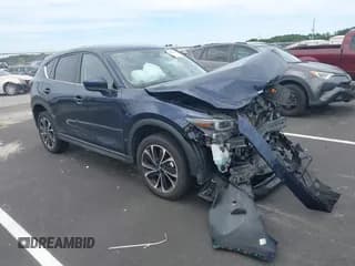 ✅ 2022 Mazda CX-5 S Premium • VIN: JM3KFBDM0N1582108 • Lot: 43082534. Wystawiony na IAAI z przebiegiem 48 833 mil. Bezpłatny archiwum sprzedaży aukcyjnych z USA i szczegółowy raport historii pojazdu na DreamBid. Zdjęcie 1.