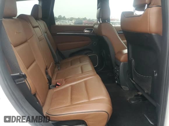 ✅ 2015 Jeep Grand Cherokee Summit • VIN: 1C4RJFJG6FC779415 • Lot: 84226075. Listed on Copart with 284,795 mi. Free auction sales archive from the USA and detailed vehicle history report at DreamBid. Image 11.