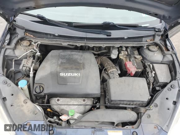 ✅ 2010 Suzuki Kizashi SE • VIN: JS2RF9A31A6100289 • Лот: 72898494. Опубликован ранее на Copart с пробегом 90 766 миль. Бесплатный доступ к архиву аукционных продаж из США и подробный отчёт об истории автомобиля на DreamBid. Изображение 11.