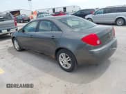 ✅ 2005 Pontiac G6 • VIN: 1G2ZG548954116740 • Lot: 42843615. Wystawiony na IAAI z przebiegiem 153 477 mil. Bezpłatny archiwum sprzedaży aukcyjnych z USA i szczegółowy raport historii pojazdu na DreamBid. Zdjęcie 3.