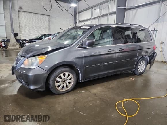 ✅ 2010 Honda Odyssey EX • VIN: 5FNRL3H49AB042421 • Lot: 81254515. Listed on Copart with 168,469 mi. Free auction sales archive from the USA and detailed vehicle history report at DreamBid. Image 1.