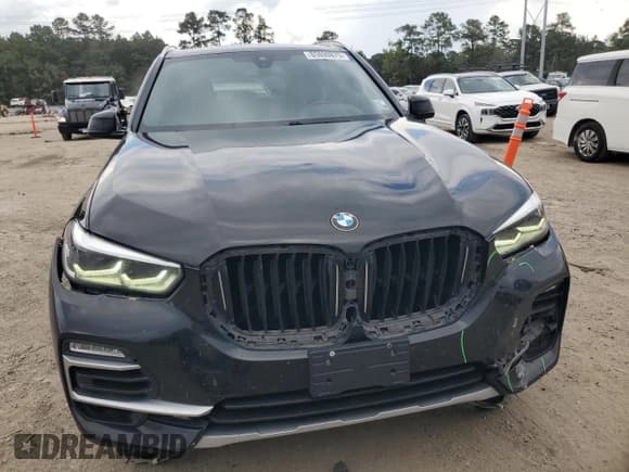 ✅ 2020 BMW X5 sDrive40i • VIN: 5UXCR4C05L9C61518 • Lot: 85830875. Listed on Copart with 69,703 mi. Free auction sales archive from the USA and detailed vehicle history report at DreamBid. Image 5.