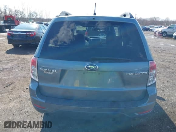 ✅ 2009 Subaru Forester X • VIN: JF2SH63669H718186 • Lot: 41869293. Listed on IAAI with 122,445 mi. Free auction sales archive from the USA and detailed vehicle history report at DreamBid. Image 16.