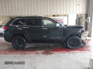 ✅ 2014 Jeep Grand Cherokee Overland • VIN: 1C4RJFCG8EC339255 • Lot: 43575140. Wystawiony na IAAI z przebiegiem 122 893 mil. Bezpłatny archiwum sprzedaży aukcyjnych z USA i szczegółowy raport historii pojazdu na DreamBid. Zdjęcie 13.