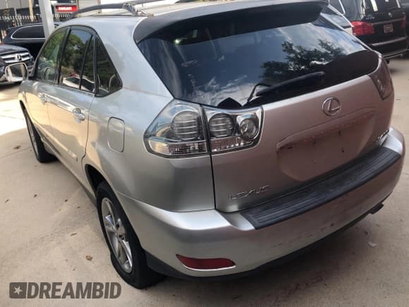 ✅ 2007 Lexus RX 400h • VIN: JTJGW31U272003252 • Лот: 68384215. Опубликован ранее на Copart с пробегом 249 080 миль. Бесплатный доступ к архиву аукционных продаж из США и подробный отчёт об истории автомобиля на DreamBid. Изображение 3.
