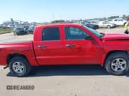 ✅ 2005 Dodge Dakota SLT • VIN: 1D7HW48N05S250364 • Лот: 43319038. Опубликован ранее на IAAI с пробегом 106 385 миль. Бесплатный доступ к архиву аукционных продаж из США и подробный отчёт об истории автомобиля на DreamBid. Изображение 14.