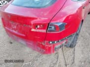 ✅ 2021 Tesla Model S Plaid • VIN: 5YJSA1E60MF447203 • Lot: 42025120. Listed on IAAI with 58,190 mi. Free auction sales archive from the USA and detailed vehicle history report at DreamBid. Image 23.