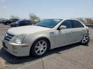 ✅ 2011 Cadillac STS RWD • VIN: 1G6DW6ED0B0120126 • Лот: 64843145. Опубликован ранее на Copart с пробегом 111 774 миль. Бесплатный доступ к архиву аукционных продаж из США и подробный отчёт об истории автомобиля на DreamBid. Изображение 1.