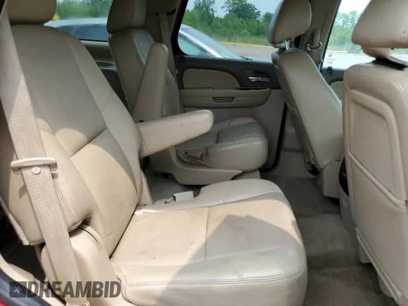 2013 Chevrolet Tahoe LTZ z VIN 1GNSKCE06DR211595, wystawiony jako Copart lot #67392565 z przebiegiem 202 317 mil mil oraz Szkoda całkowita • Salvage title. Historia ofert i sprzedaży dostępna na DreamBid. Obrazek 11.