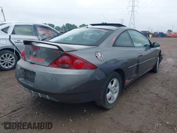 ✅ 2002 Mercury Cougar • VIN: 1ZWFT61L925618994 • Lot: 42509179. Listed on IAAI with 159,093 mi. Free auction sales archive from the USA and detailed vehicle history report at DreamBid. Image 4.