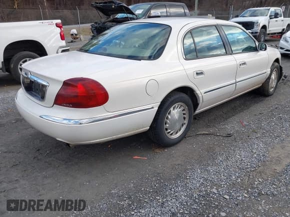 ✅ 1998 Lincoln Continental • VIN: 1LNFM97VXWY619313 • Lot: 41477852. Listed on IAAI with 158,973 mi. Free auction sales archive from the USA and detailed vehicle history report at DreamBid. Image 4.