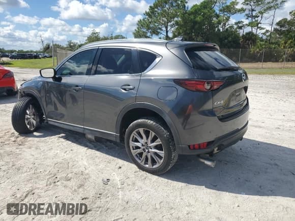 ✅ 2019 Mazda CX-5 Grand Touring • VIN: JM3KFADM7K0622051 • Lot: 86213585. Listed on Copart with 68,022 mi. Free auction sales archive from the USA and detailed vehicle history report at DreamBid. Image 2.