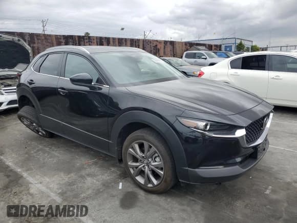 ✅ 2024 Mazda CX-30 S Carbon Edition • VIN: 3MVDMBCM1RM618954 • Lot: 53690825. Listed on Copart with 16,776 mi. Free auction sales archive from the USA and detailed vehicle history report at DreamBid. Image 4.