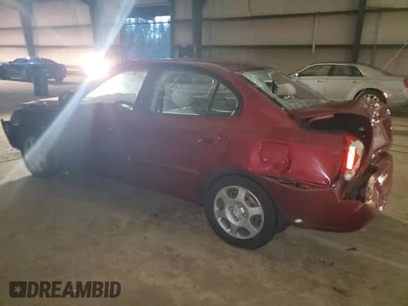 2002 Hyundai Elantra GLS z VIN KMHDN45D72U460530, wystawiony jako Copart lot #81283554 z przebiegiem 125 827 mil mil oraz Szkoda całkowita • Salvage title. Historia ofert i sprzedaży dostępna na DreamBid. Obrazek 2.