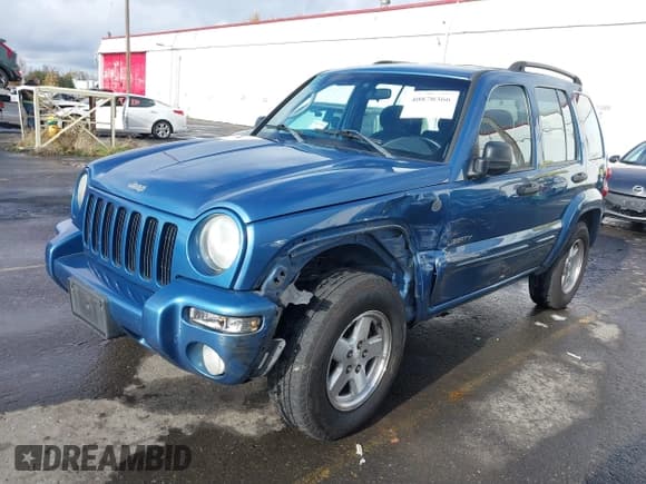 ✅ 2004 Jeep Liberty Limited • VIN: 1J4GL58KX4W232319 • Lot: 40870366. Listed on IAAI with 226,249 mi. Free auction sales archive from the USA and detailed vehicle history report at DreamBid. Image 2.