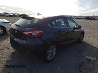 ✅ 2018 Chevrolet Cruze LT • VIN: 3G1BE6SM4JS631141 • Lot: 70752372. Wystawiony na Copart z przebiegiem 123 383 mil. Bezpłatny archiwum sprzedaży aukcyjnych z USA i szczegółowy raport historii pojazdu na DreamBid. Zdjęcie 3.