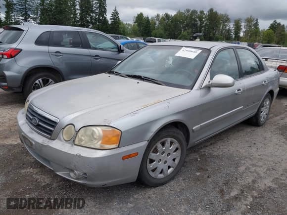 ✅ 2004 Kia Optima LX • VIN: KNAGD126545362194 • Лот: 42910648. Опубликован ранее на IAAI с пробегом 169 022 миль. Бесплатный доступ к архиву аукционных продаж из США и подробный отчёт об истории автомобиля на DreamBid. Изображение 12.