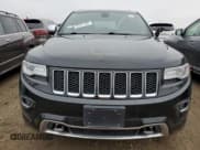 ✅ 2015 Jeep Grand Cherokee Overland • VIN: 1C4RJFCM7FC880093 • Lot: 82241784. Listed on Copart with 158,346 mi. Free auction sales archive from the USA and detailed vehicle history report at DreamBid. Image 5.