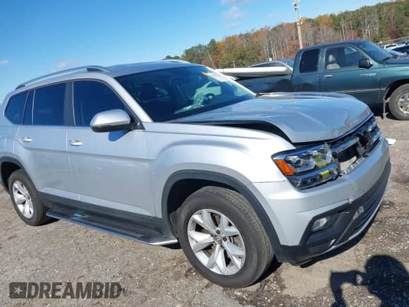 ✅ 2018 Volkswagen Atlas SE • VIN: 1V2CR2CA4JC552635 • Lot: 43647631. Wystawiony na IAAI z przebiegiem 93 186 mil. Bezpłatny archiwum sprzedaży aukcyjnych z USA i szczegółowy raport historii pojazdu na DreamBid. Zdjęcie 1.