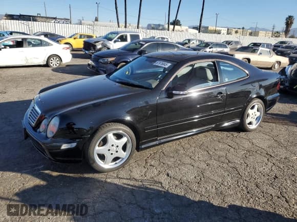 ✅ 2001 Mercedes-Benz CLK 320/430 • VIN: WDBLJ70G41F189166 • Лот: 87976845. Опубликован ранее на Copart с пробегом 139 316 миль. Бесплатный доступ к архиву аукционных продаж из США и подробный отчёт об истории автомобиля на DreamBid. Изображение 1.