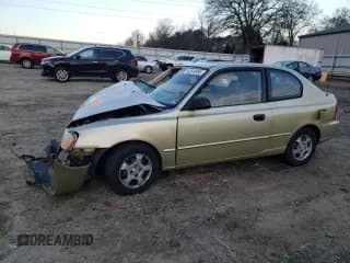 ✅ 2001 Hyundai Accent GS • VIN: KMHCG35C81U152921 • Лот: 42519995. Опубликован ранее на Copart с пробегом 154 669 миль. Бесплатный доступ к архиву аукционных продаж из США и подробный отчёт об истории автомобиля на DreamBid. Изображение 1.
