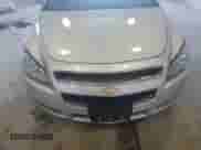 2012 Chevrolet Malibu 2LT z VIN 1G1ZD5E07CF330472, wystawiony jako Copart lot #69040254 z przebiegiem 136 393 mil mil oraz Szkoda całkowita • Salvage title. Historia ofert i sprzedaży dostępna na DreamBid. Obrazek 12.