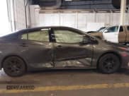 ✅ 2017 Toyota Prius Advanced • VIN: JTDKARFP7H3003423 • Лот: 43589206. Опубликован ранее на IAAI с пробегом 133 729 миль. Бесплатный доступ к архиву аукционных продаж из США и подробный отчёт об истории автомобиля на DreamBid. Изображение 13.